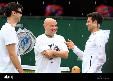 Novak Djokovic With Coaches Andre Agassi And Mario Ancic Left On Day