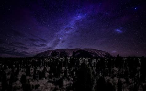 Starry Sky Over Ayers Rock In Winter
