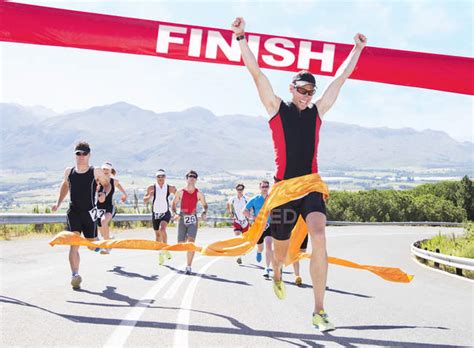 Runner Crossing Race Finish Line — People Success Stock Photo