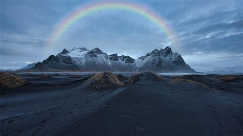 1366x768 Rainbow Over Snow Covered Mountain 8k 1366x768 Resolution Hd