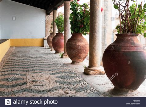 Large Clay Vases With Shrubs And Columns Stock Photo Alamy