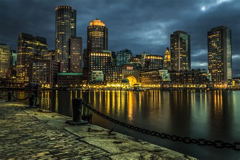 Lighted City Skylines And Deep Blue Sky In Night 2560x1600 Wallpaper