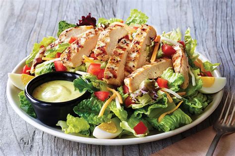 Chicken salad is a classic salad recipe with diced chicken, creamy mayonnaise, crisp celery, green onion, sweet grapes, and fresh herbs. Grilled Chicken Salad - Applebee's Menu For Every Appetite