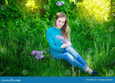 Beautiful Girl Sitting On The Grass In The Park Stock Image Image Of Beautiful Leisure 55601315