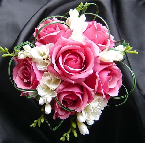 Colorful bouquet with different flower composition pink paper. Wedding Flowers: bouquet of rose flowers