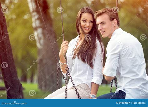 Couple In Love On Swings Stock Image Image Of Cheerful 89382087