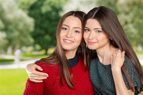 Two Beautiful Sisters Hugging Stock Image Image Of Cute Laughing
