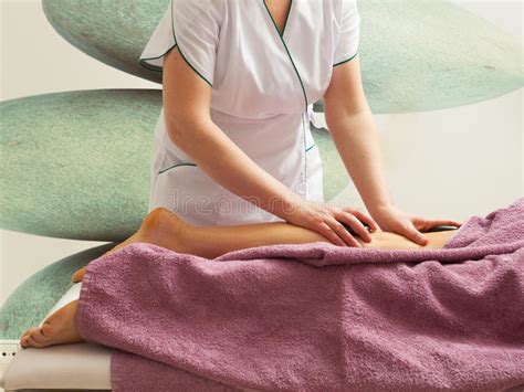 Female Masseuse Doing Massage With Hot Stones Stock Image Image Of