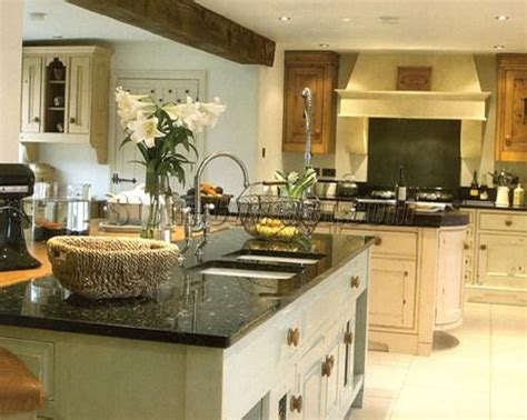 Maybe you would like to learn more about one of these? emerald pearl granite w/ cream cabinets | Granite ...