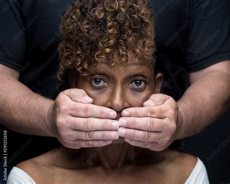 Black Woman Being Silenced By White Man In Racism Stock Photo Adobe Stock