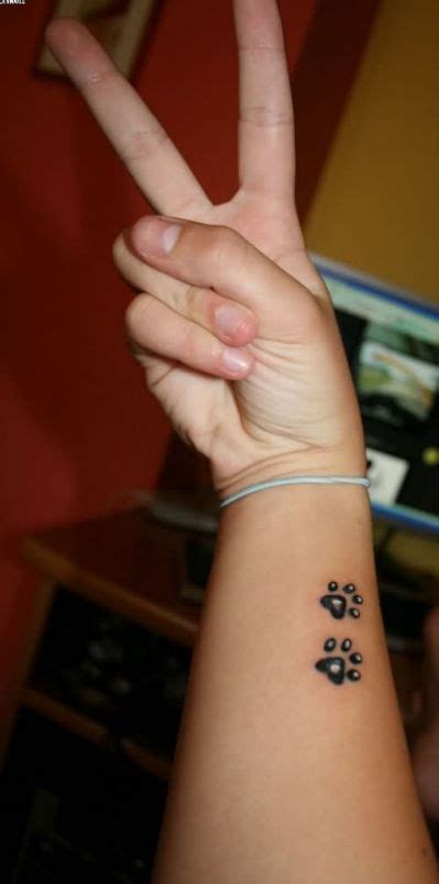 The 80 Cutest Paw Print Tattoos Ever Page 10 The Paws Arm Tattoo