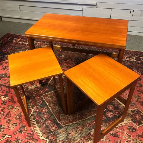 To produce a table in vintage style, you will needan old box (rummage in the attic or in the barn — and you're sure to find it?), 4 feet stylized antique or really old, screwdriver and screws, sandpaper and tank waterproofing agent. Mcintosh Teak Tri Form Nest Of Tables • Vintage • Retro ...
