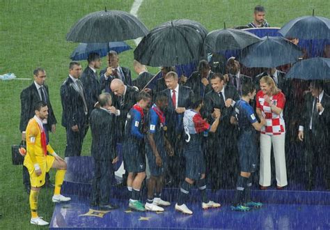 Vladimir Putin Criticised For Being Given An Umbrella Before Croatian