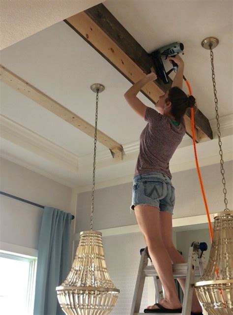 Diy faux beams ceiling makeover | plank over popcorn ceilings faux shiplap. DIY Faux Beams in my Dining Room - Frills & Drills ...