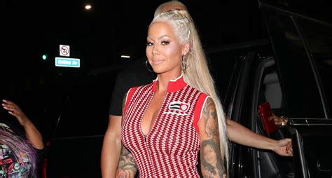 amber rose shows off her long blonde hair and curves at the club amber rose just jared