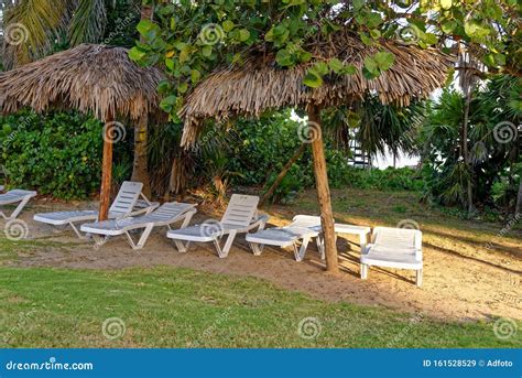 Beach Chair With Umbrella On Beautiful Tropical Beach Stock Image