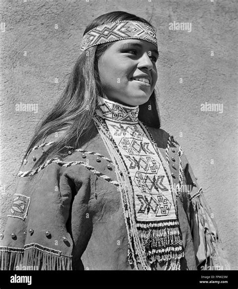 1950s Portrait Smiling Native American Indian Woman Wearing Beaded Headband Collar Neckpiece And