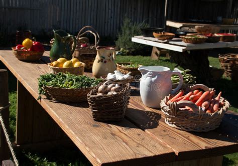 Table Full Of Fresh Garden Variety Vegetables Stock Photo