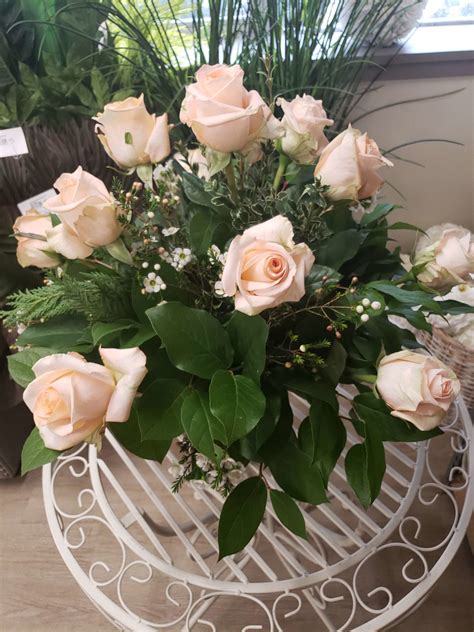 Maybe you would like to learn more about one of these? 5. CLASSIC DOZEN ROSES ARRANGED IN A VASE - Flower School 101