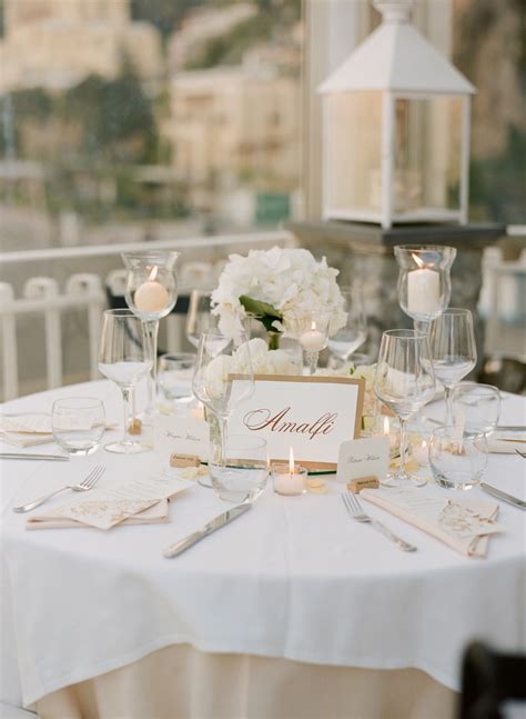 Lining the length of the table, silver dollar eucalyptus and gold tapered candles add simple, elegant color to this formal table setting. Gold and White Reception Table Setting 1 - Elizabeth Anne ...