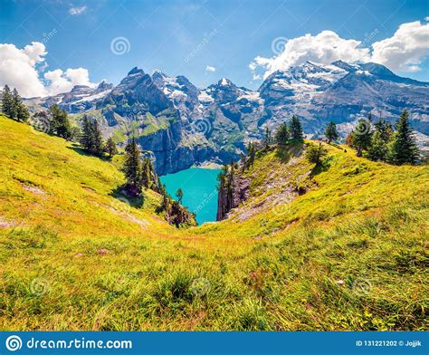 Colorful Summer Morning On The Unique Oeschinensee Lake Stock Photo