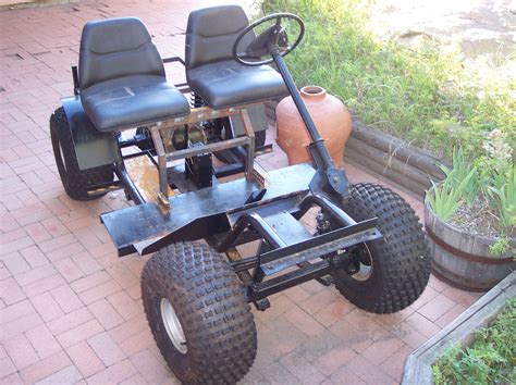 Here's a convenient way to transport your garden and lawn care equipment without multiple trips or heavy lifting. The beginnings of a golf cart modified to an off road ...