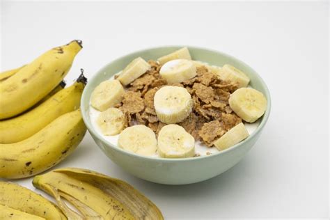Cereal Flake With Pieces Of Banana Fruits Slice In The Green Bowl Stock Photo Image Of