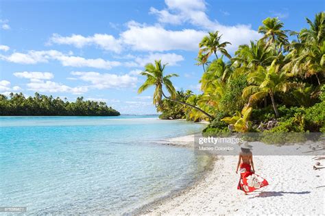 Woman Walking On Beautiful Tropical Beach High Res Stock Photo Getty