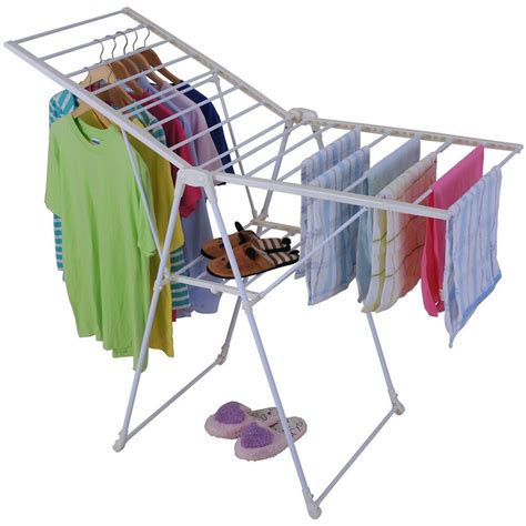 Our hand made timber rack is suspended on pulleys from the ceiling. Foldable Clothes Laundry Drying Rack Dryer Hanger Stand ...