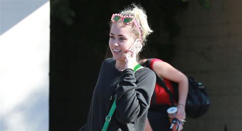 Miley Cyrus Strips Off Her Sweater For A Visit To The Nail Salon