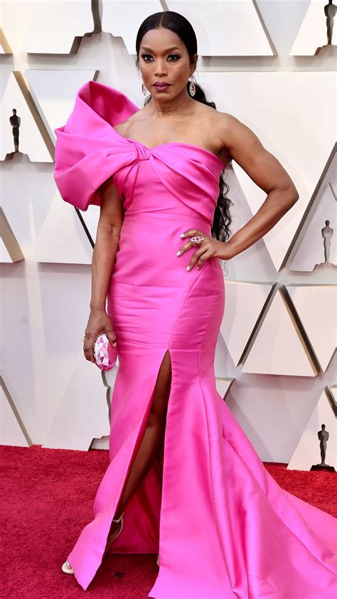 See the best oscar dresses of years past. 2019 Oscars: Angela Bassett is wearing a hot pink Reem ...