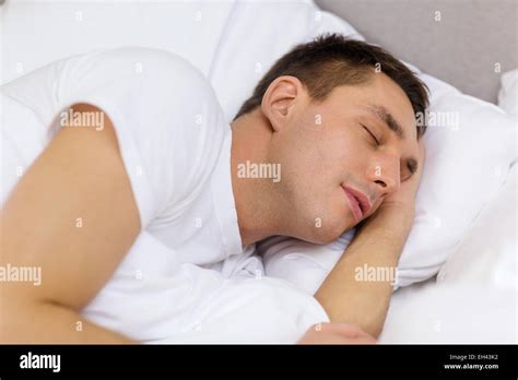 Handsome Man Sleeping In Bed Stock Photo Alamy
