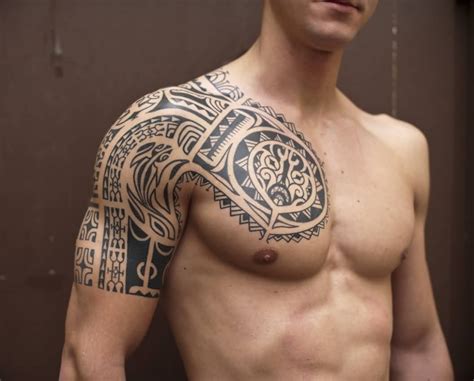 Black and white polynesian tribal tattoo on chest and full sleeve. Mytattooland.com: Shoulder tattoos for men!