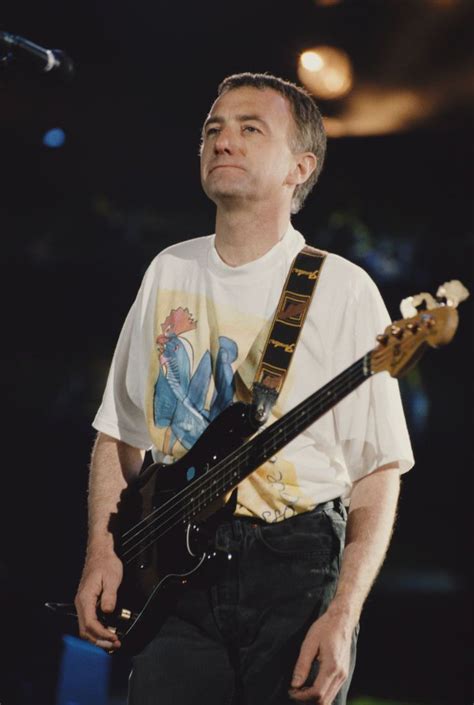 English Bass Guitarist John Deacon Of Rock Group Queen Performs Live Onstage With The Band At
