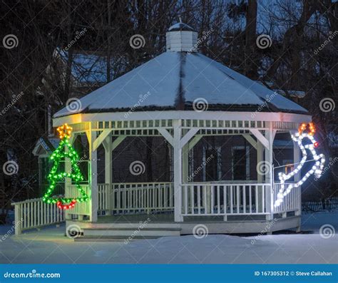 Snow Covered Gazebo With Christmas Lights Decorations Stock Photo