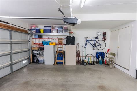 Hanging ladder horizontally on the wall using dedicated wall hooks. 10 Best Overhead Garage Storage 2020 | Top Rated Ceiling Mounted Storage Racks