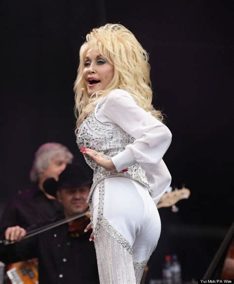 dolly parton on glastonbury miming accusations my boobs and hair are fake but what is real is