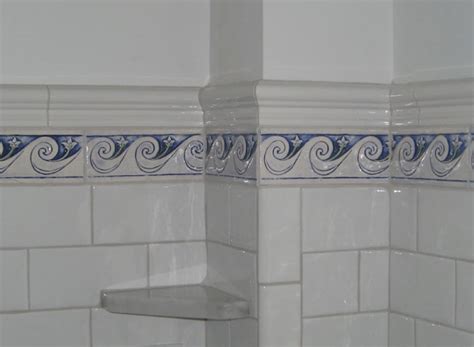 Pretty border tiles for bathrooms can be combined with accent tiles to create a mesmerizing decoration which can act as backsplashes around the countertop. Decorative handmade ceramic tile: Decorative handmade ...