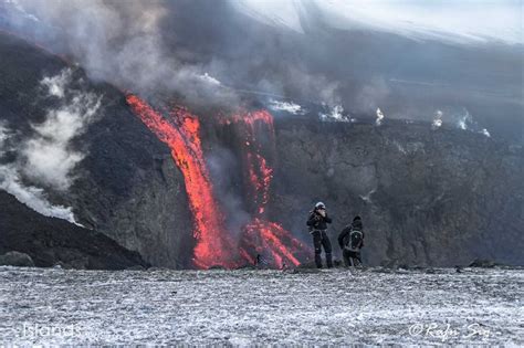 Hikers Walking Along Lava Falls On A Glacier Icelandic Times