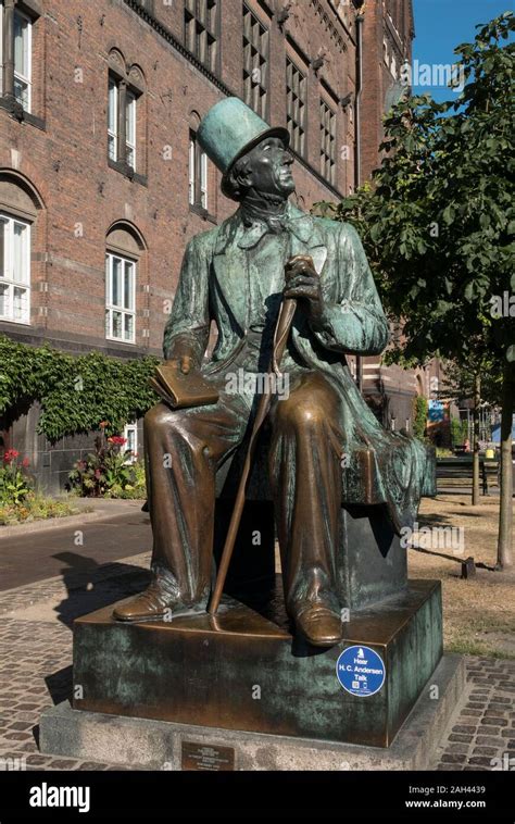 The Bronze Statue Of Hans Christian Andersen Near City Hall Square