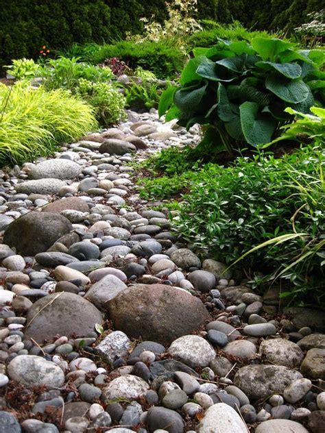 Diy Dry Creek Beds Rock Garden Design River Rock Landscaping