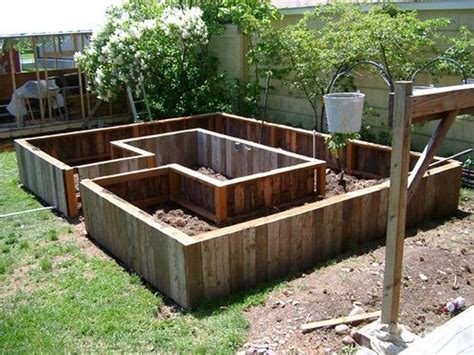 This raised garden bed has a very unique style. DIY Easy Access Raised Garden Bed | The Owner-Builder Network