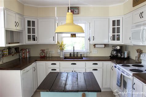 They were in pretty good shape so we lived with them for a year. DIY Wide Plank Butcher Block Counter Tops | SimplyMaggie.com