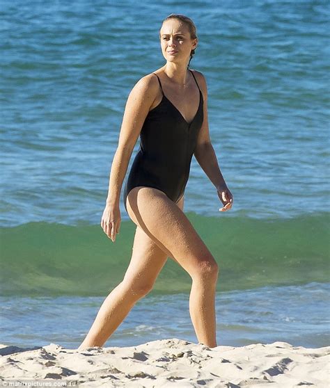 Sylvia Jeffreys Shows Off Her Slender Figure In A One
