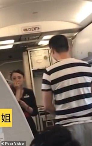 Flight Attendant Is Sacked After Her Boyfriend Proposed To Her At Feet Daily Mail Online