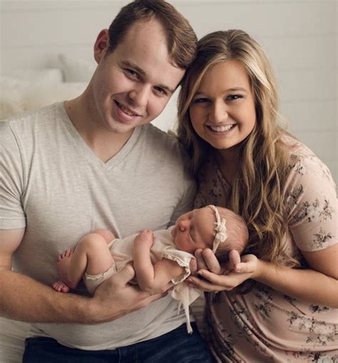 Joseph And Kendra Smiling With Their Daughter Addison While Taking A Photo Shoot James Duggar