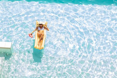 3 600 Bildbanksfoton Bilder Och Royaltyfria Bilder Med Girl Sunbathing Pool Istock