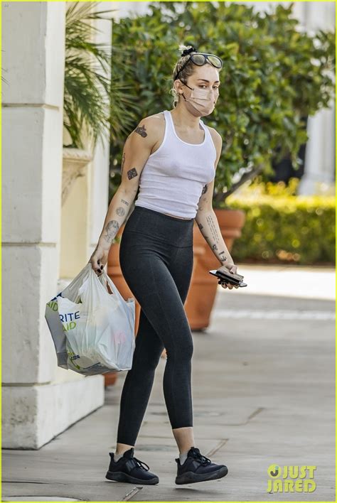 miley cyrus goes braless in see through tank top while running errands photo 4518912 miley