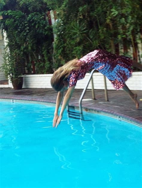 Gigi Hadid Jumped In A Pool Wearing A Sequin Dress Teen Vogue