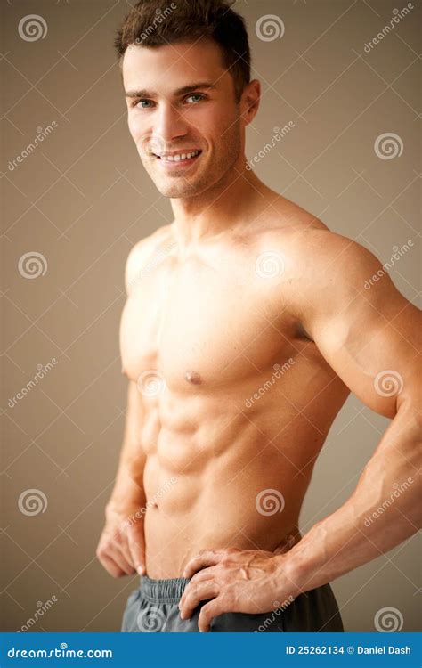 Portrait Of Smiling Man With Hand On His Hips Stock Photo Image Of